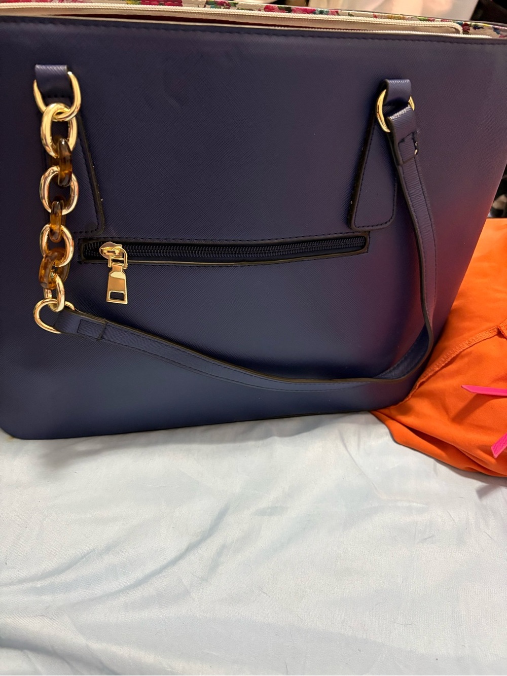 Structured Navy Fashion Tote with Gold Chain Accent and Wallet.
